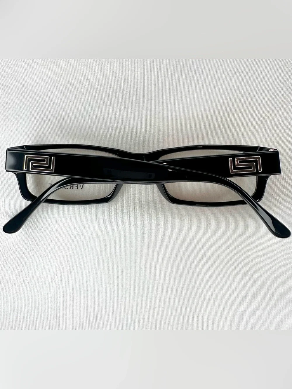 Versace Glossy Black Rectangular Glasses with Silver Logo Accents